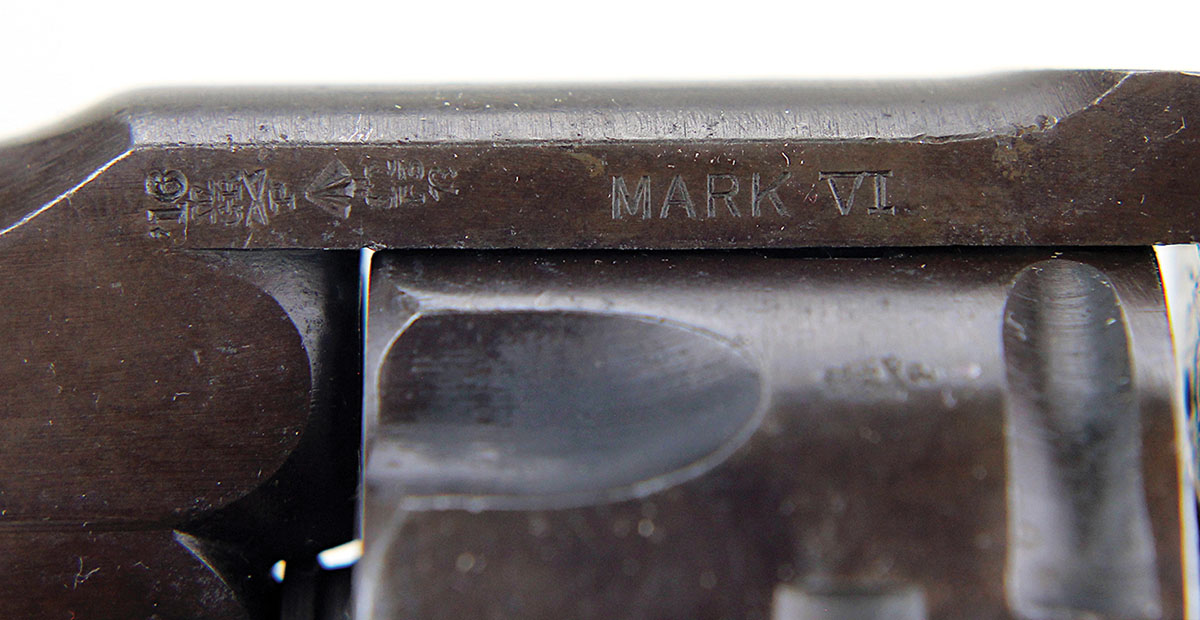 Proofmarks include the British “broad arrow” acceptance stamp and model.